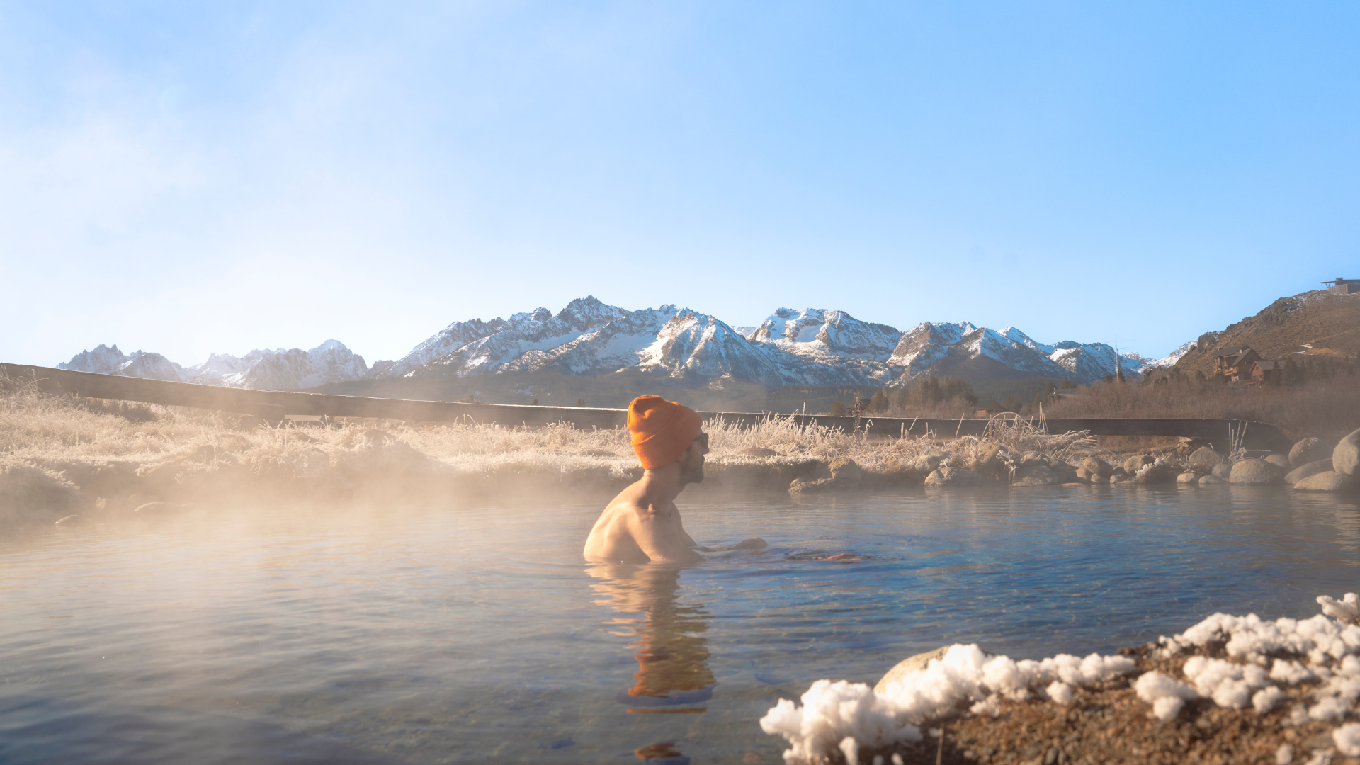 An person relaxes in an Idaho Hot spring 
